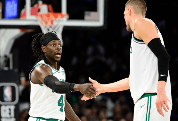 celtics-melepas-holiday-dan-porzingis