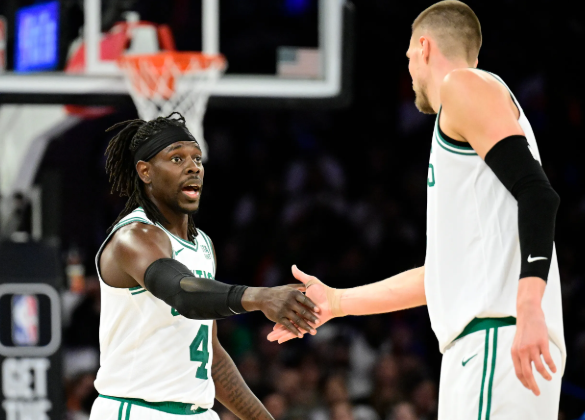 celtics-melepas-holiday-dan-porzingis